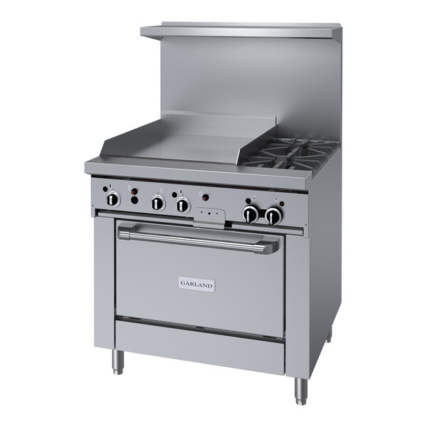 A large stainless steel Garland gas range with two burners.