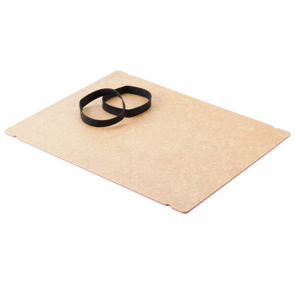 A brown menu board with black rubber bands on a table.