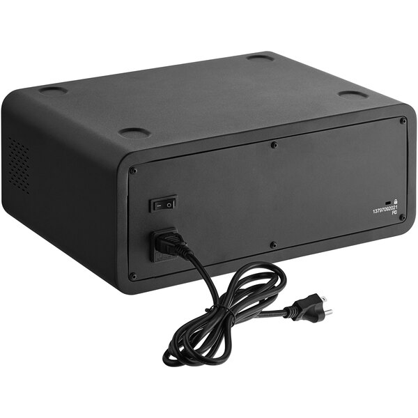 A black rectangular Luxor EdgePower 3-Bay charging station base with a power cord.