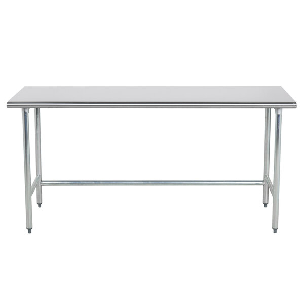 An Advance Tabco stainless steel work table with an open metal base.