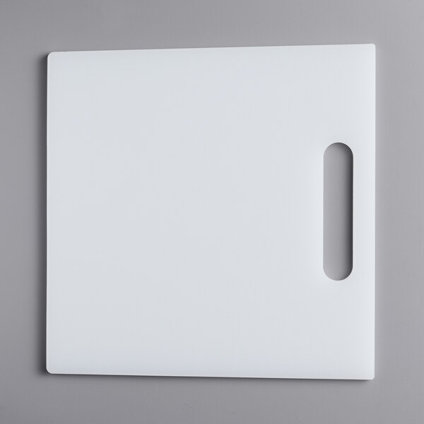 A white CaterGator cutting board with a handle.