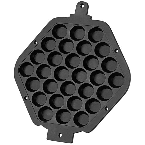 A black plastic pan with holes in it.