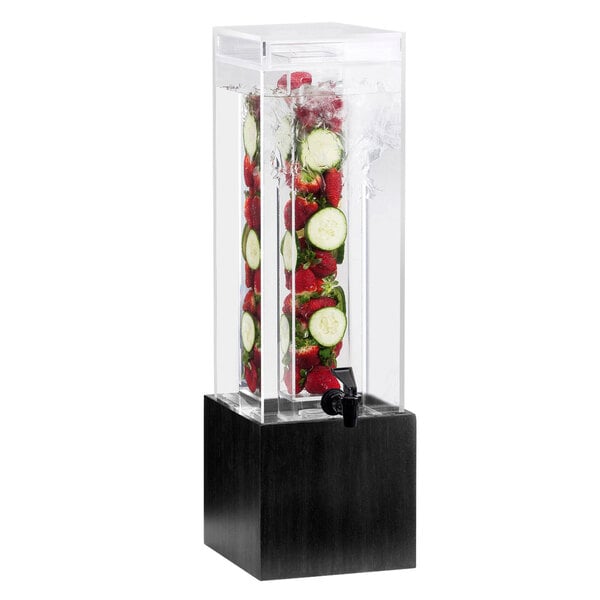 A Cal-Mil Midnight bamboo infusion beverage dispenser with fruits in it.