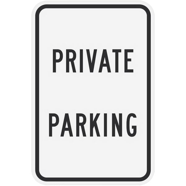 A white rectangular sign with black text that says "Private Parking"