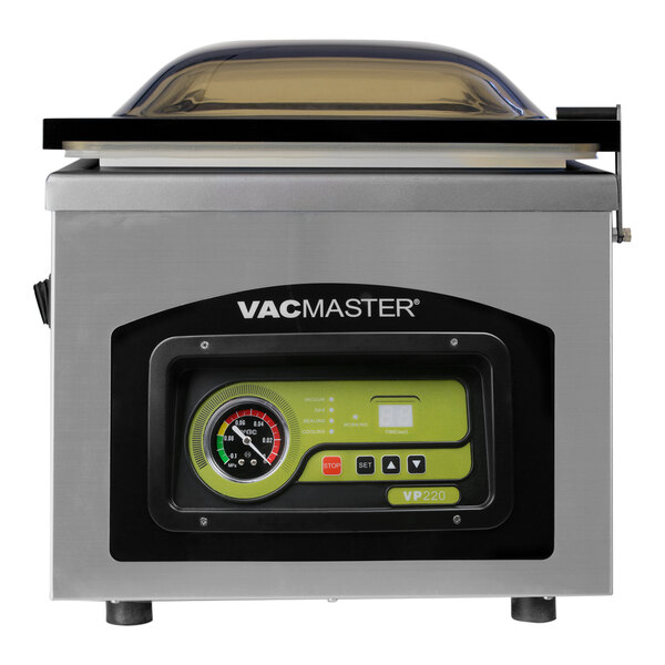 An ARY VacMaster VP220 tabletop vacuum packaging machine on a counter.