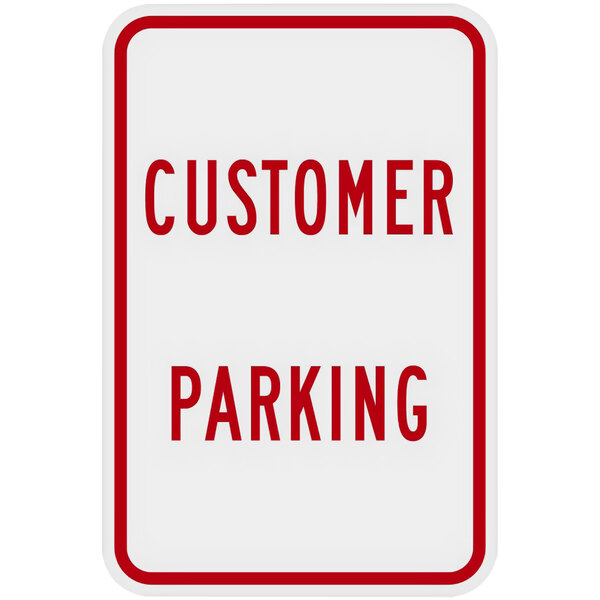 A white sign with red text that says "Customer Parking"