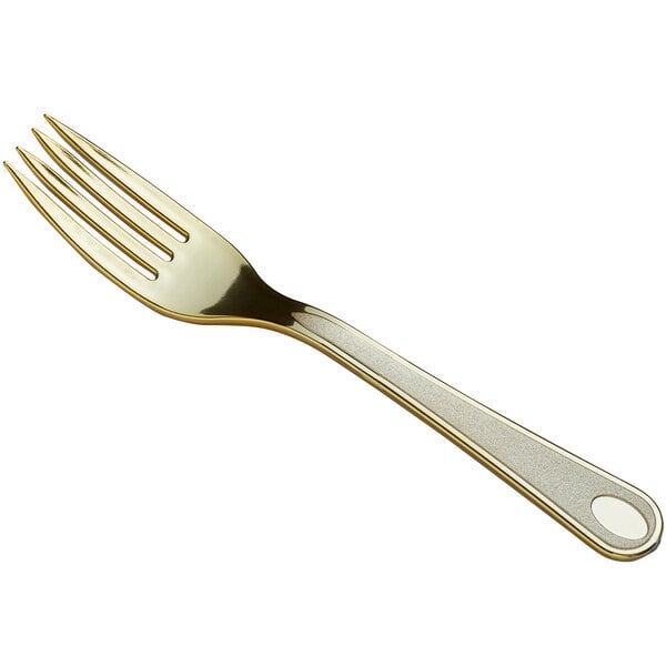 A close up of a Visions gold plastic fork with a white background.