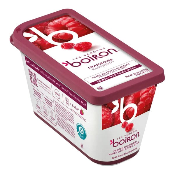 A rectangular container of Les Vergers Boiron frozen red raspberry puree weighing 2.2 pounds.