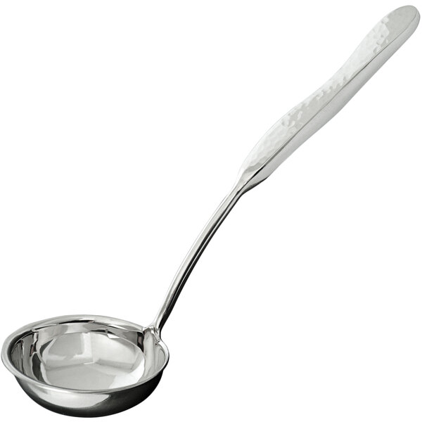 A silver ladle with a hammered finish and a long handle.