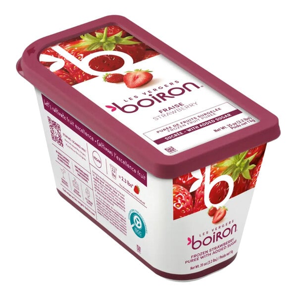 A rectangular container of Les Vergers Boiron frozen strawberry puree with added sugar.