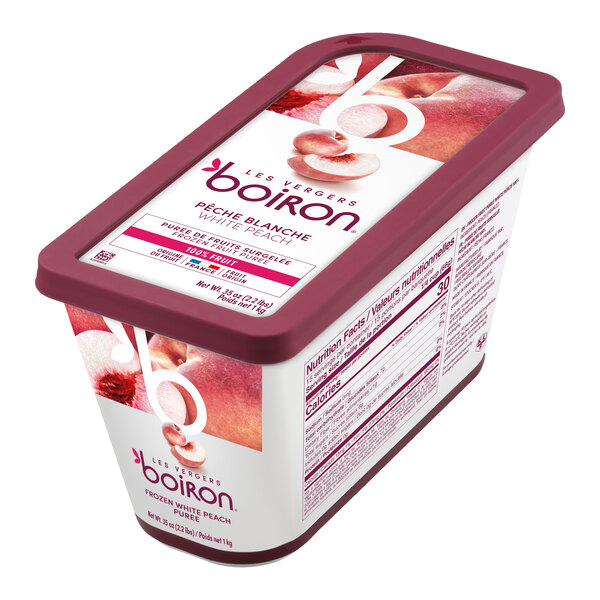 A rectangular container of Les Vergers Boiron White Peach 100% Fruit Puree weighing 2.2 pounds.