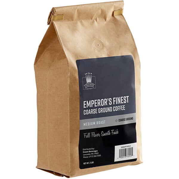 A brown Crown Beverages Emperor's Finest Coarse Ground Coffee bag with a label.