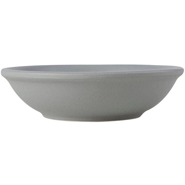 A gray Tuxton china fruit bowl.