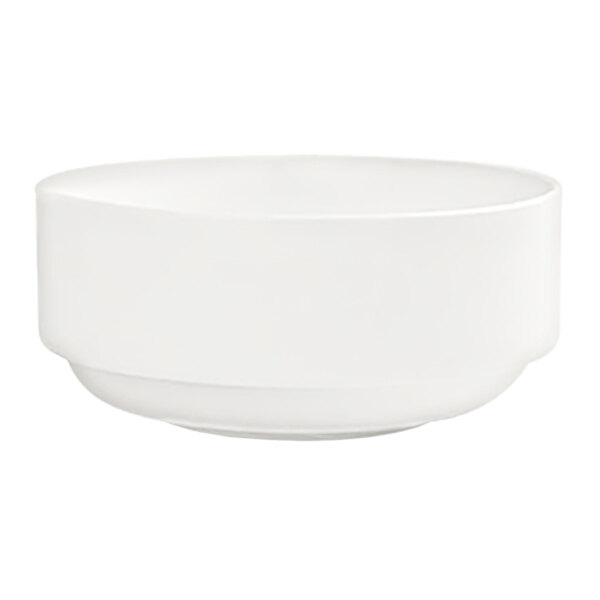 A white round stackable porcelain bowl with an 18 oz. capacity.