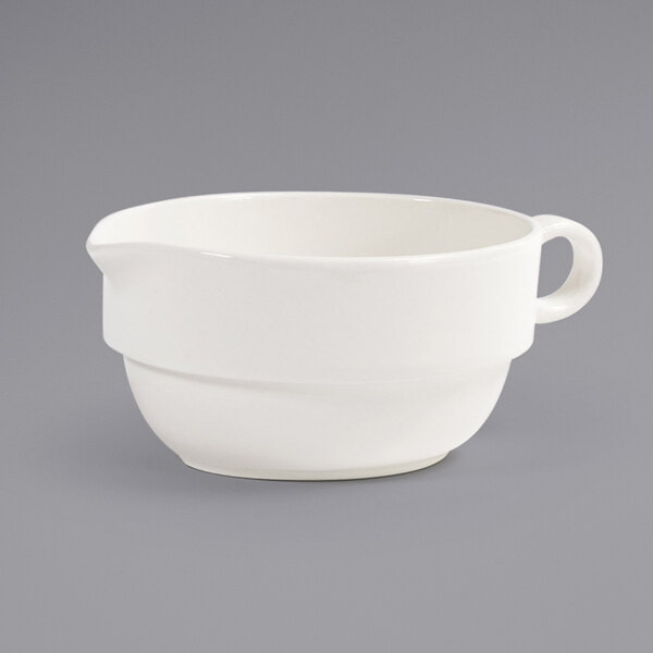 a white bowl with a handle