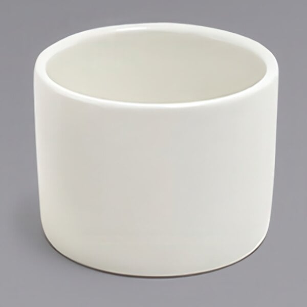 A Front of the House European white porcelain ramekin.