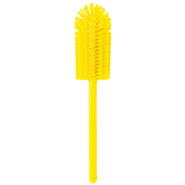 A yellow Carlisle bottle cleaning brush with a handle.