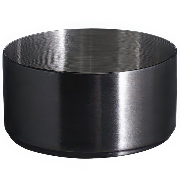 A matte black brushed stainless steel ramekin.