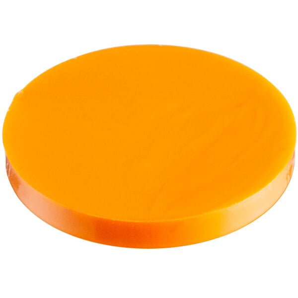 A round orange screw cover.