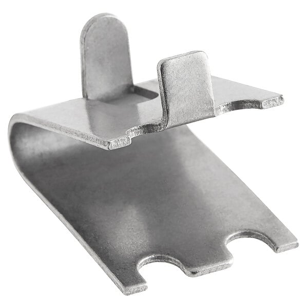 A close-up of a stainless steel shelf clip.