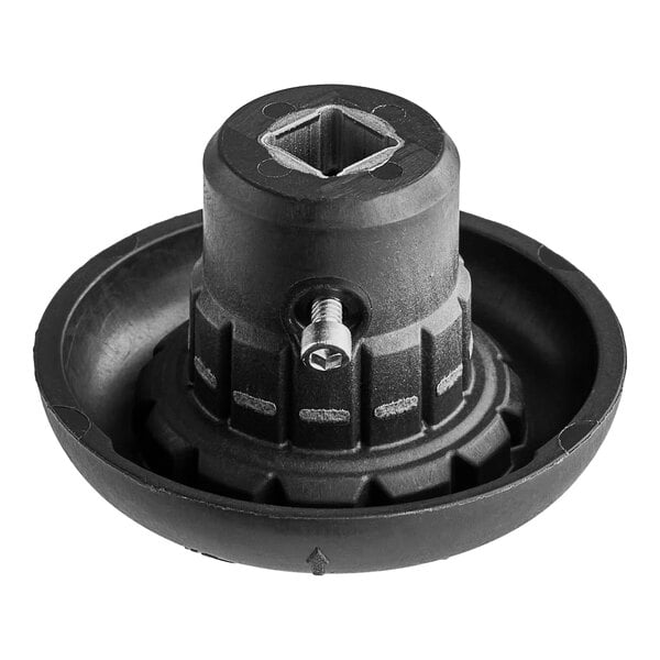 A black plastic Vitamix blender drive socket with a screw.