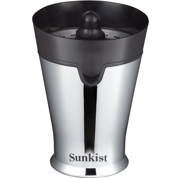 A Sunkist stainless steel citrus juicer with a black lid on a counter.