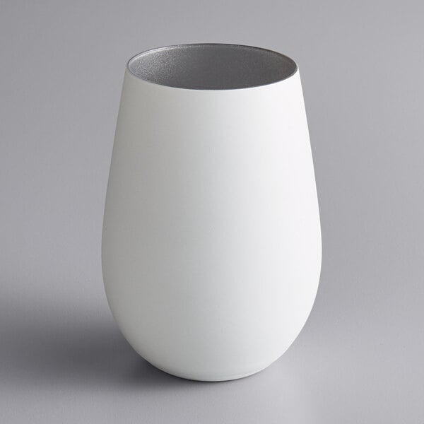 A white and silver Stolzle stemless wine glass.