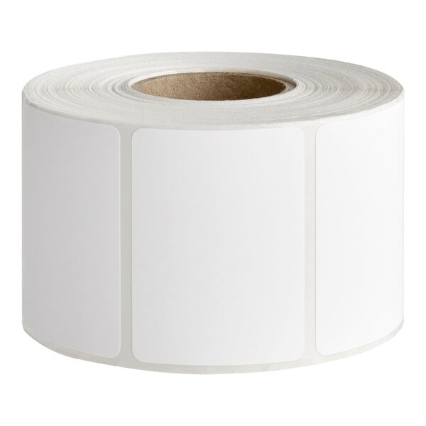 A roll of white blank permanent direct thermal labels.
