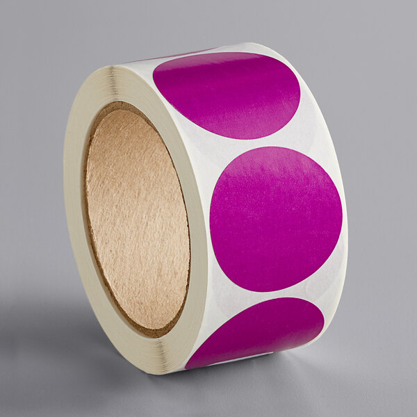 A roll of Lavex purple and white round inventory labels.