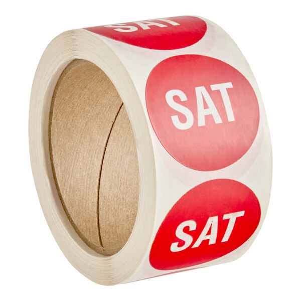 A roll of round red labels with the word 'SAT' printed in white letters.