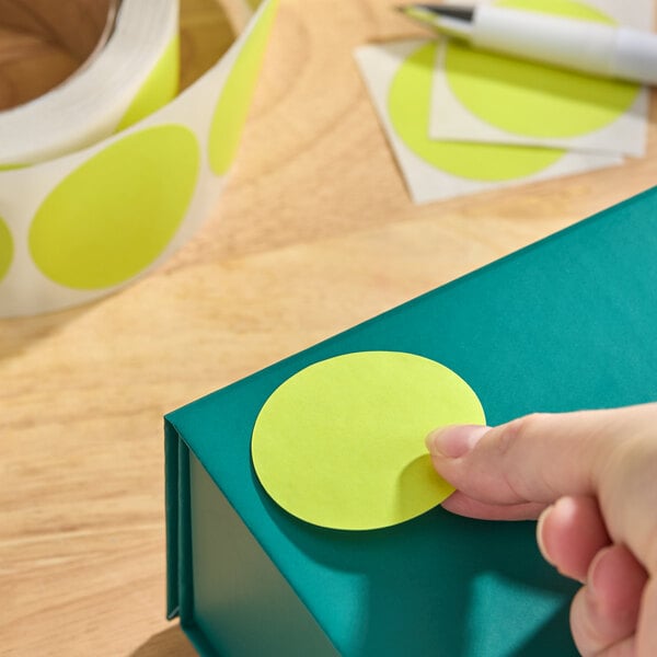 Lavex 2" Fluorescent Yellow Matte Paper Permanent Round Inventory Label - 500/Roll
