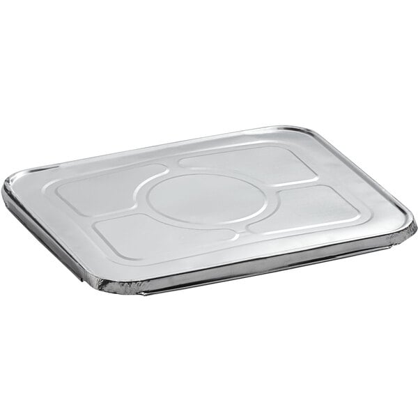 A close-up of a Choice half size foil steam table pan lid on a silver tray.