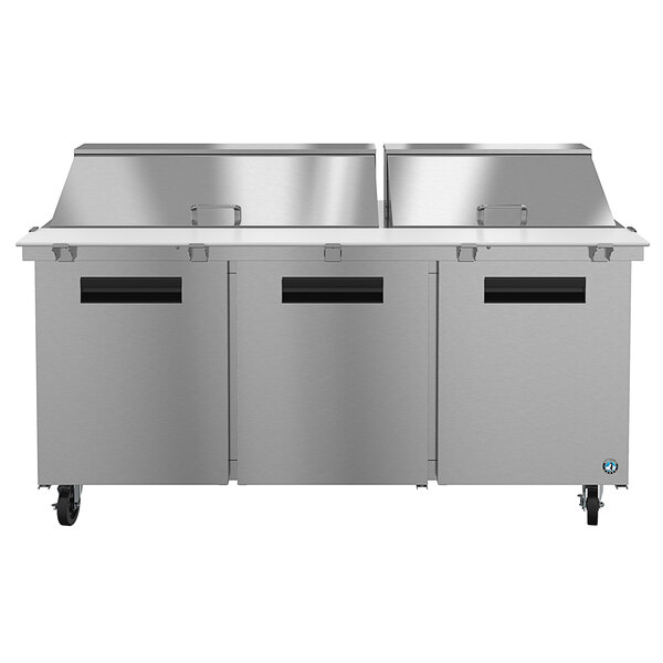 A stainless steel Hoshizaki 3 door sandwich prep table.