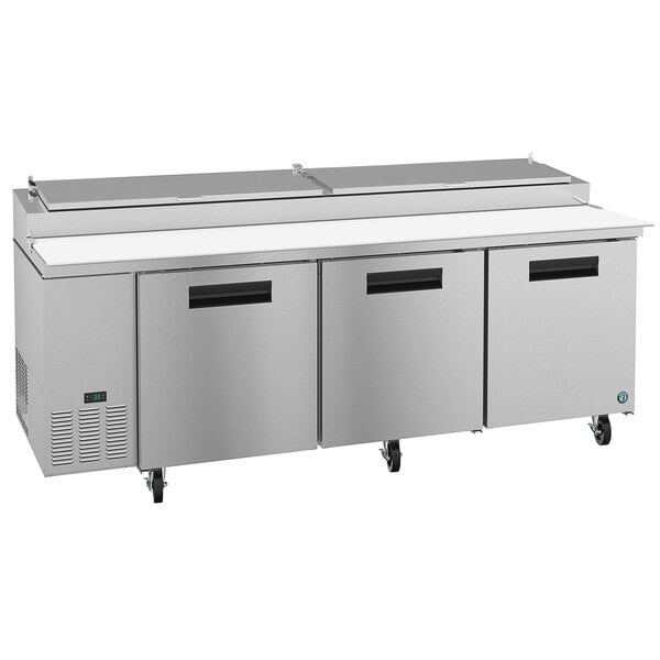 A Hoshizaki stainless steel refrigerator with three doors.