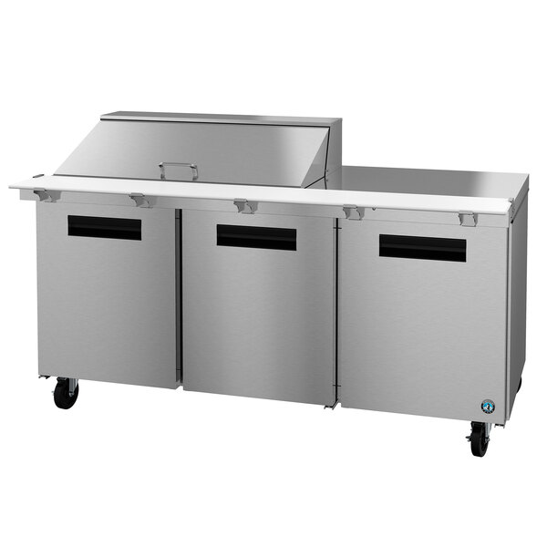 A stainless steel Hoshizaki 3 door sandwich prep table.