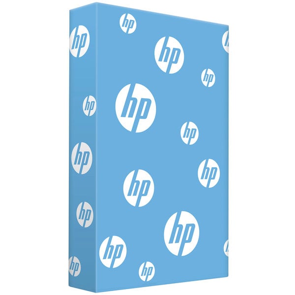 A blue box of HP Inc. Office20 multi-purpose paper with white circles and text.