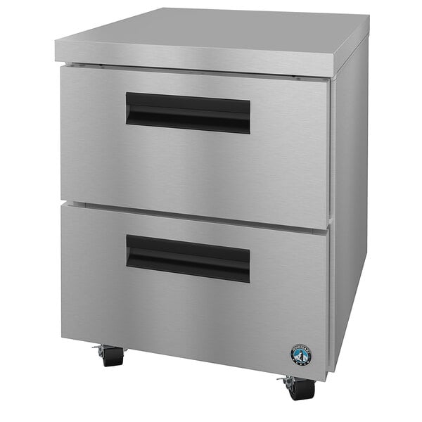 A silver Hoshizaki undercounter refrigerator with two drawers and black handles on wheels.