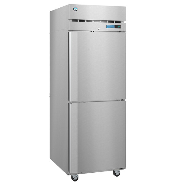 a silver refrigerator with two doors