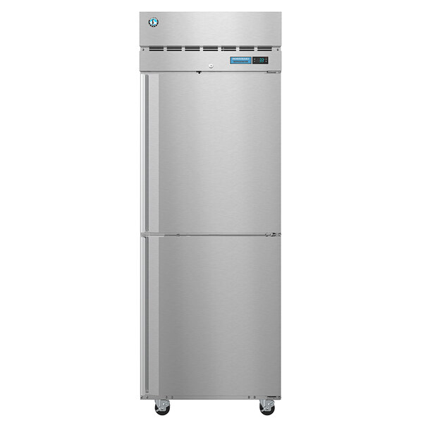 A silver Hoshizaki reach-in refrigerator with half solid doors.