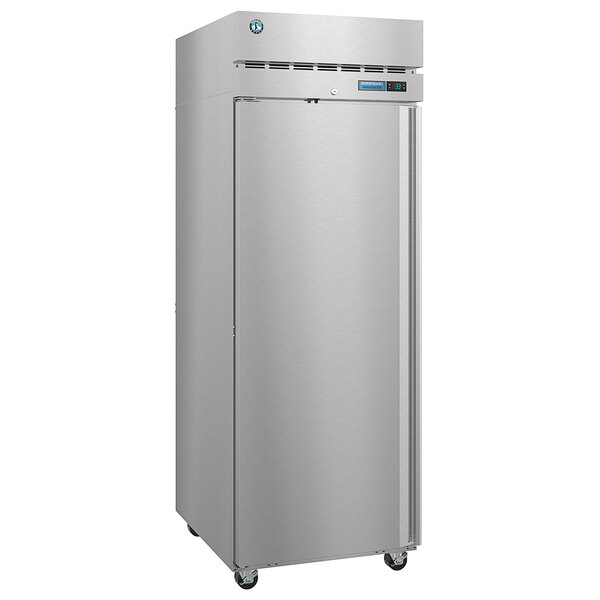 A silver Hoshizaki reach-in refrigerator with a black lid on wheels.