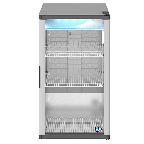 A white Hoshizaki countertop glass door refrigerator with shelves.