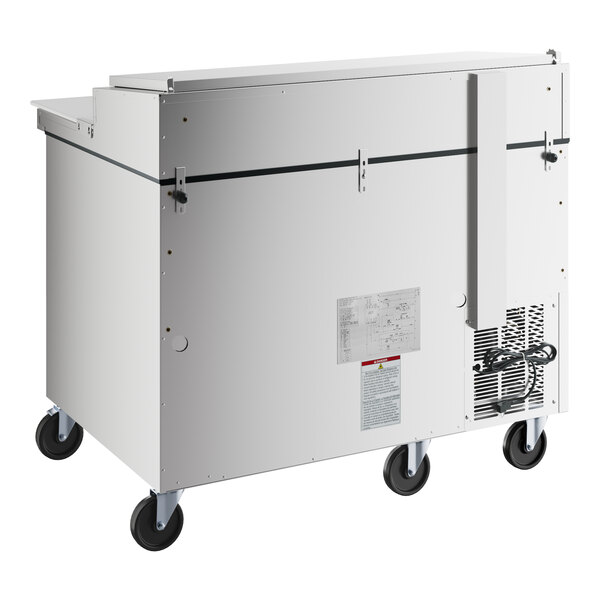 A white rectangular Hoshizaki refrigerator with wheels.