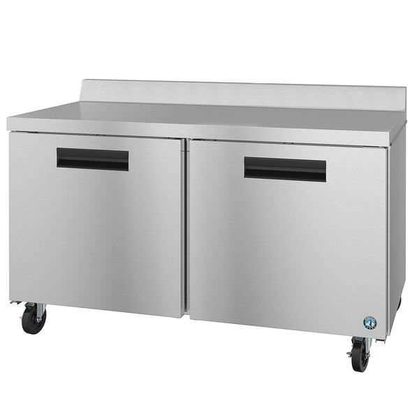 A stainless steel Hoshizaki worktop refrigerator with two doors.