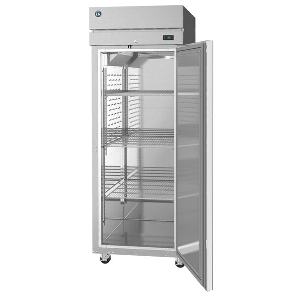 A stainless steel Hoshizaki reach-in freezer with a door open.