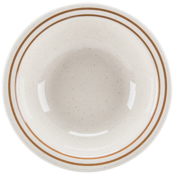 A white bowl with brown lines on it.