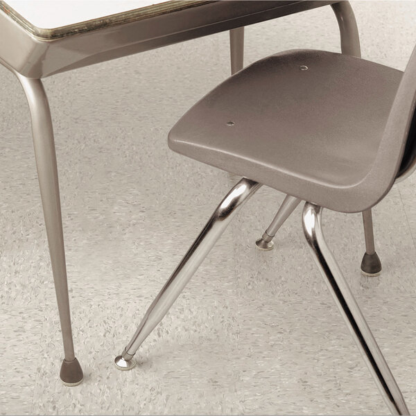Master Caster 88847 Quiet Feet Deluxe Noise Reducers on metal chair and desk legs.
