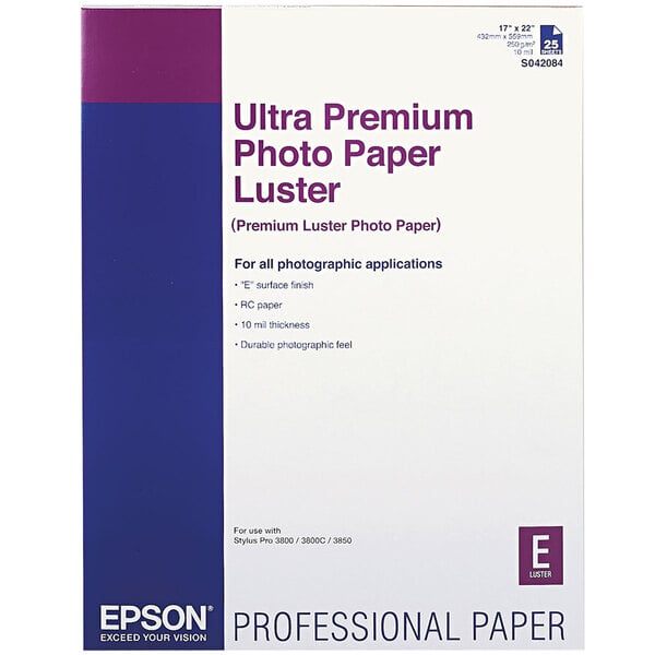 A package of white and blue Epson Ultra Premium Photo Paper with white and purple text.