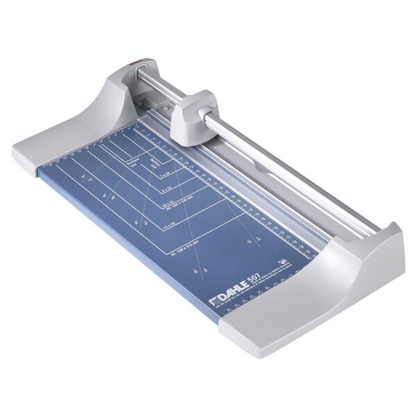 a close-up of a paper cutter