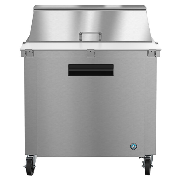 A Hoshizaki stainless steel refrigerated sandwich prep table.