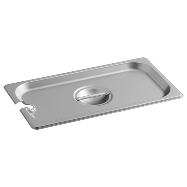 A Carlisle stainless steel slotted steam table pan cover on a tray.